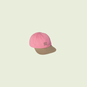 A pink cap with a tan brim